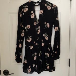 Black with pink floral prong romper. Size small. Has pockets! Low back.